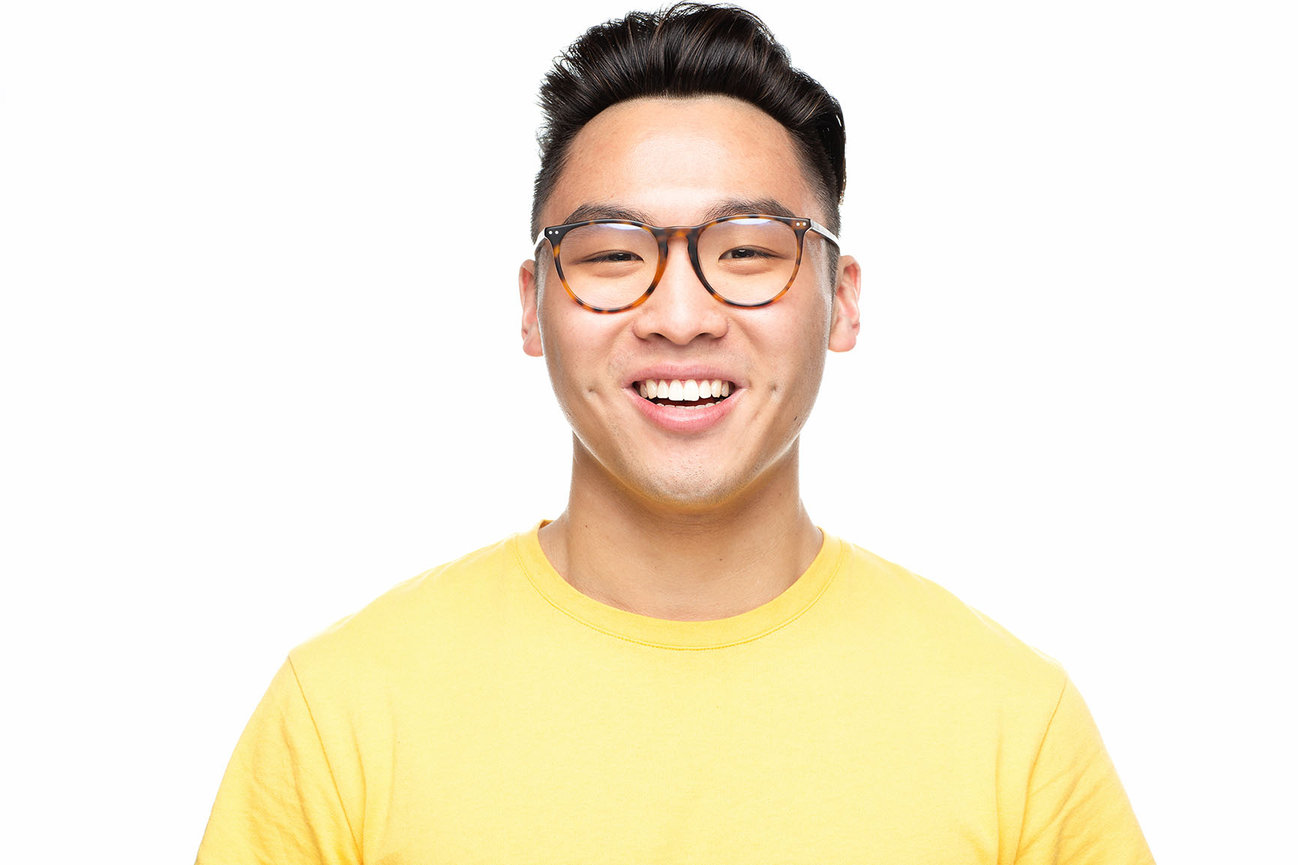 Headshot with a light studio background