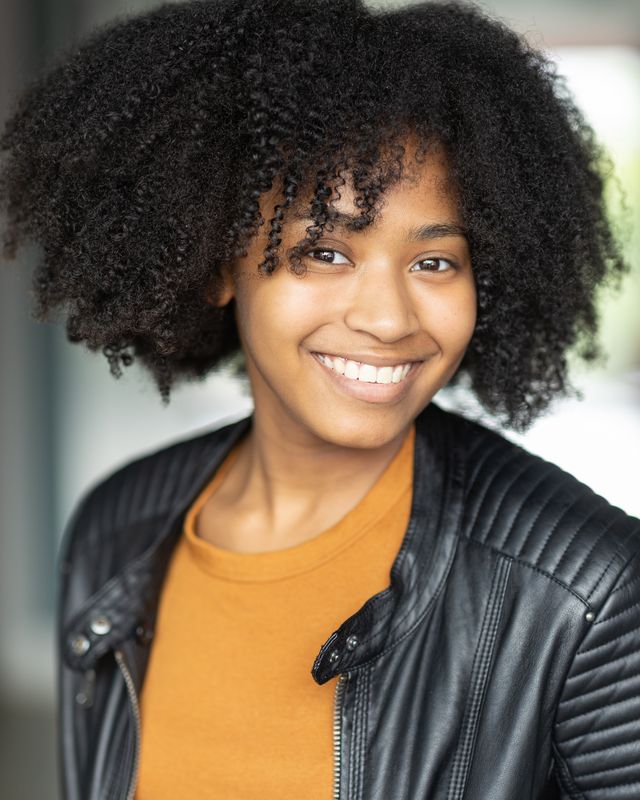 Outdoor headshot in golden hour light